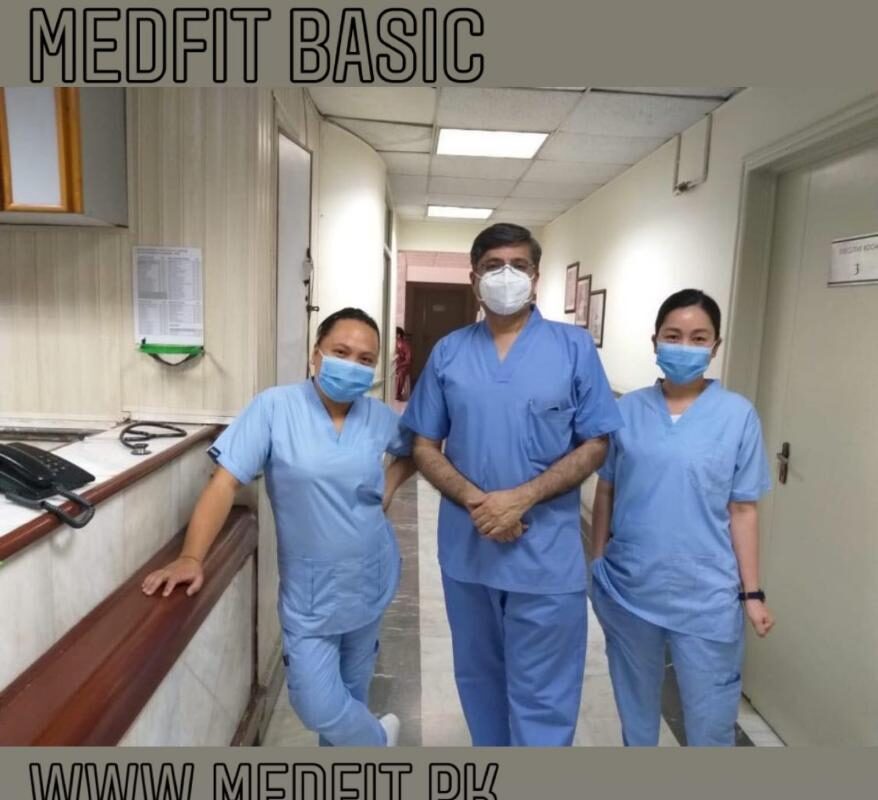 three doctors stand in front of the counter