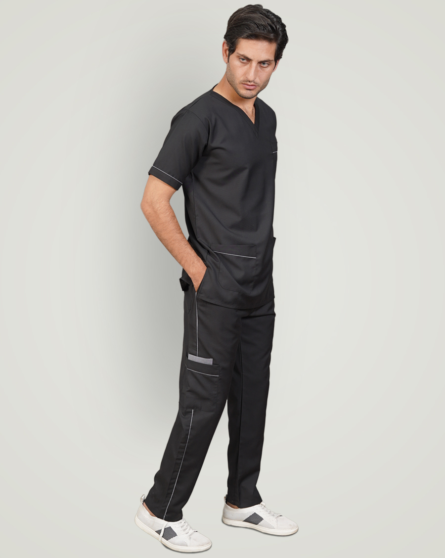 man ware doctor scrub and putting his hand in pocket